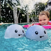 Thumbnail for SplashWhale | Magisches Badevergnügen - Wiederaufladbares leuchtendes Wal-Badespielzeug